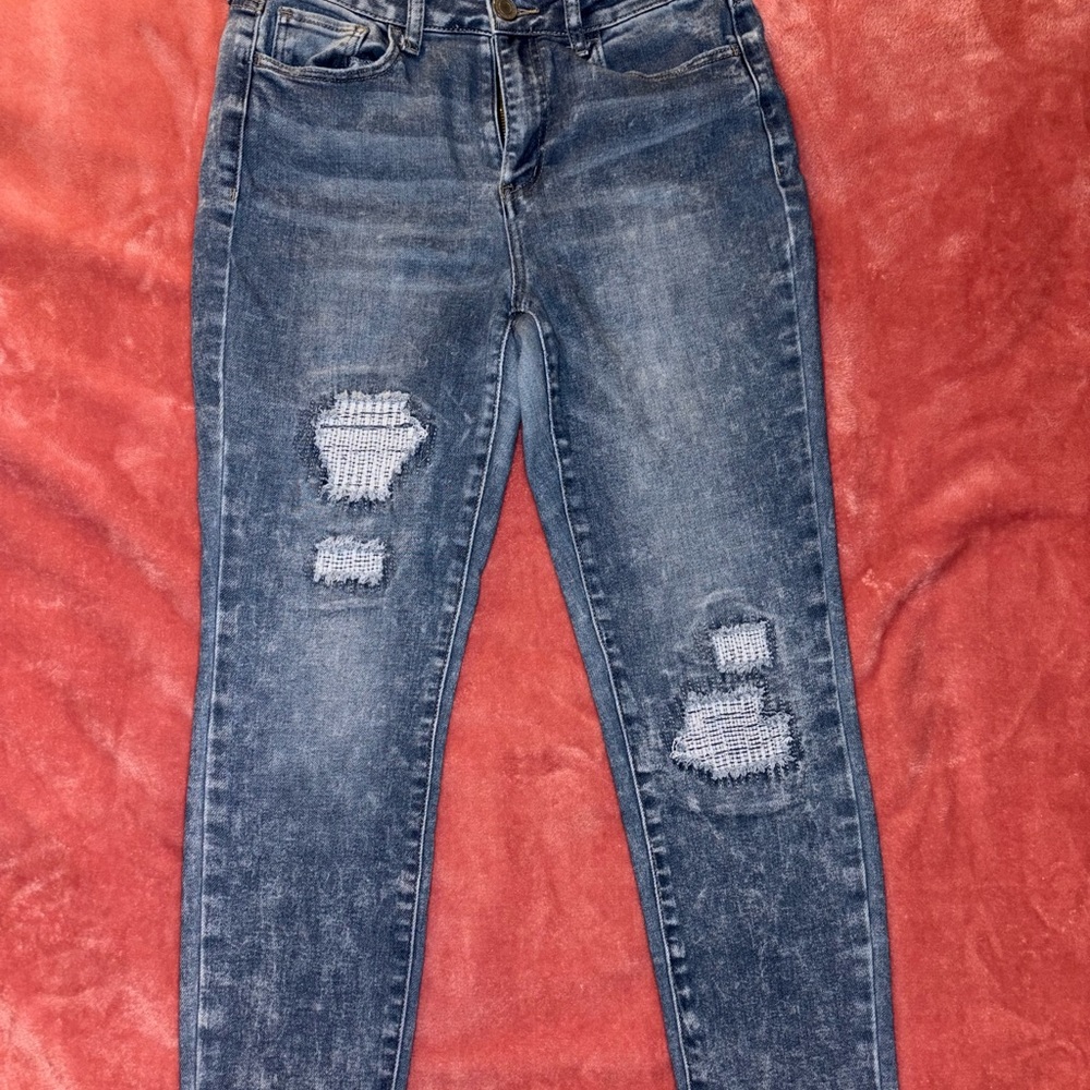 Women's Distressed Blue Jeans
